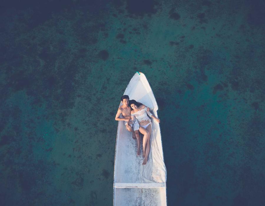 Makeup products arranged on a vanity